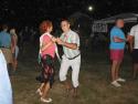 Tkanie pokrovce v prednej chyži, gazdiná sa nimi p Tkanie pokrovce v prednej chyži, gazdiná sa nimi p