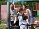Tkanie pokrovce v prednej chyži, gazdiná sa nimi p Tkanie pokrovce v prednej chyži, gazdiná sa nimi p